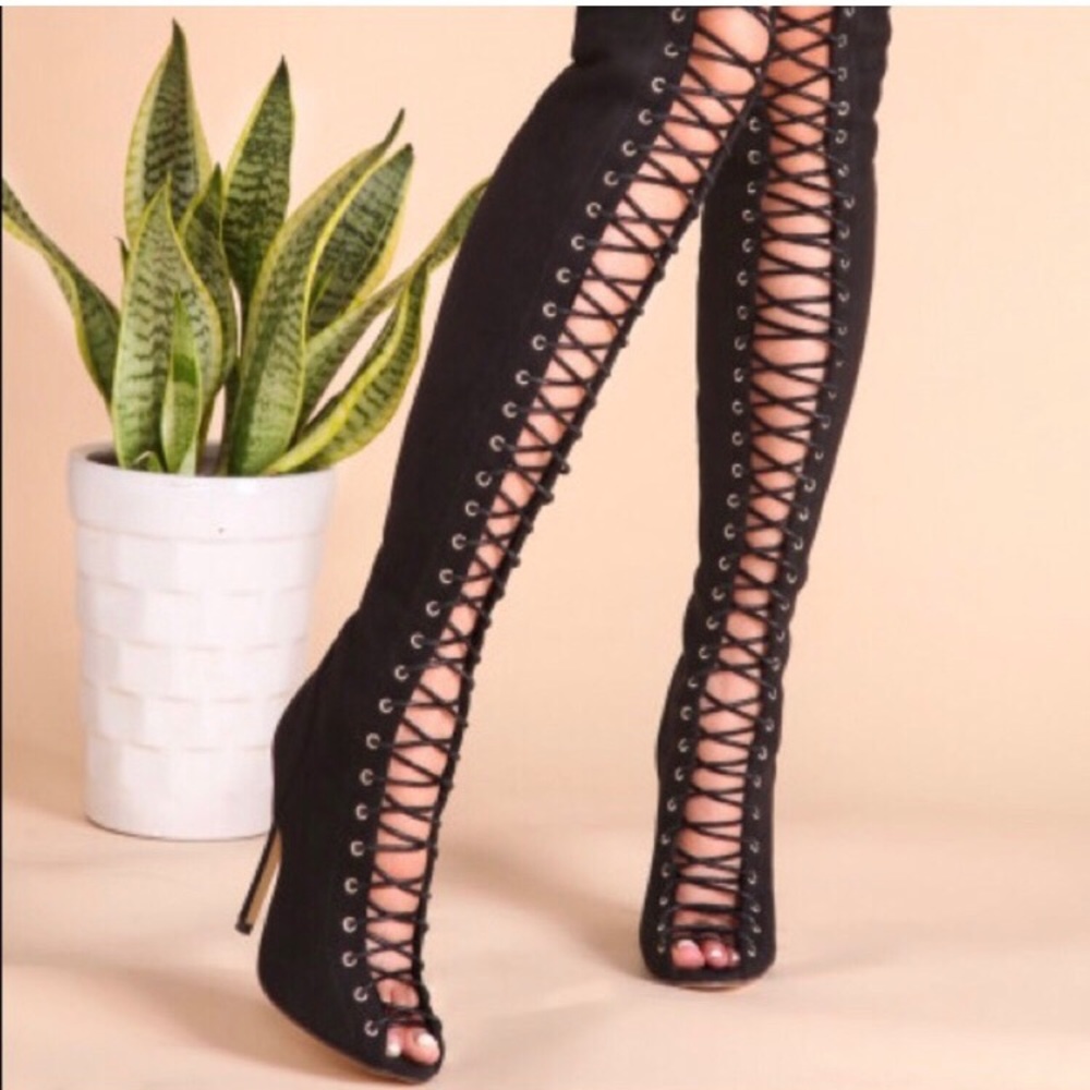 Thigh-high gladiator sandals